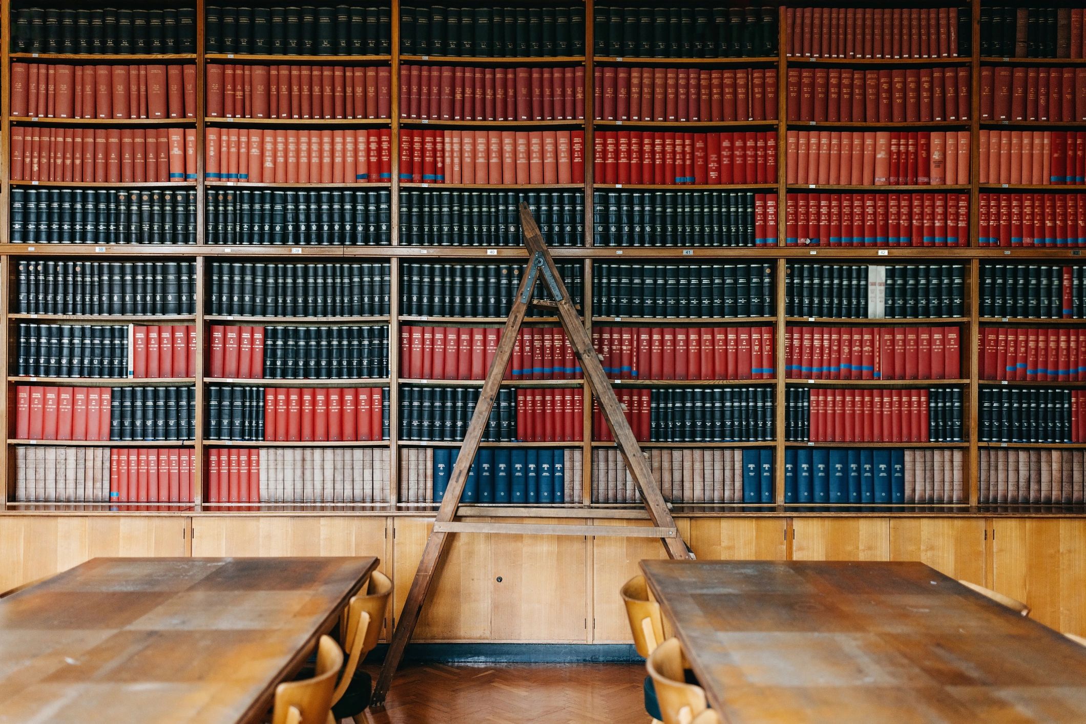 Large bookshelf filled with books in a library