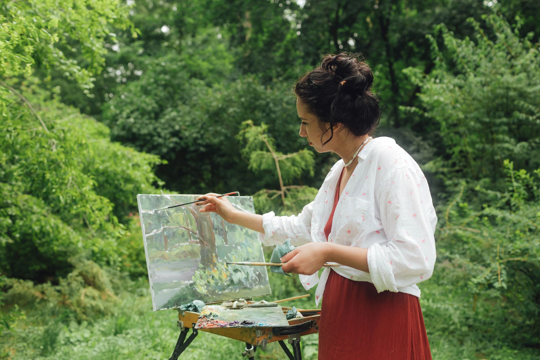 Painter working outdoors