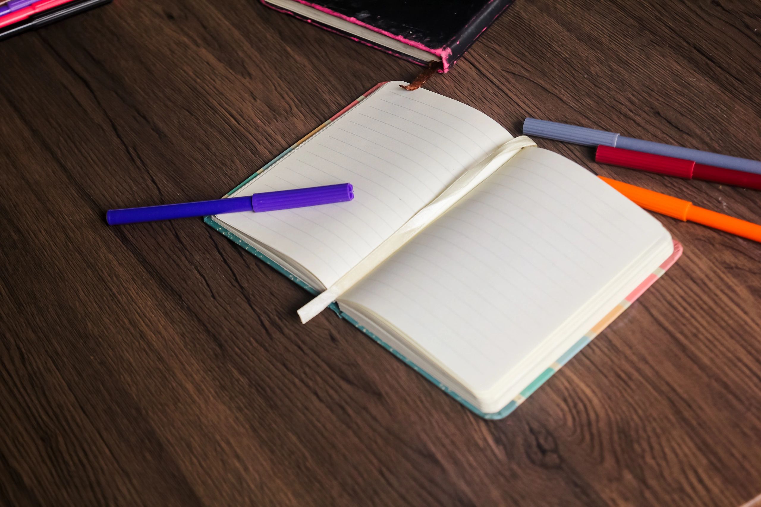 Open journal on a wooden desk